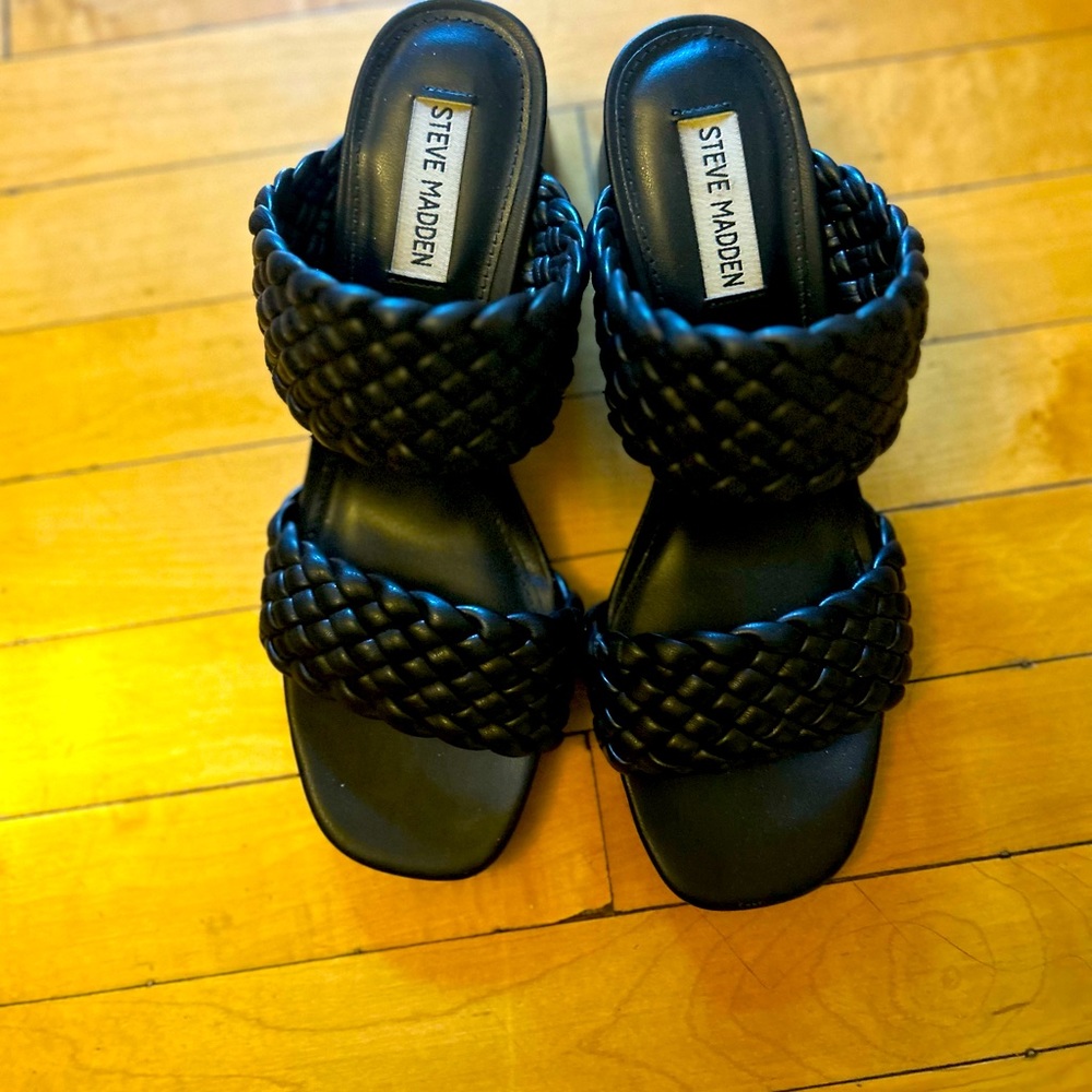 Women’s Steve Madden black heeled sandals.